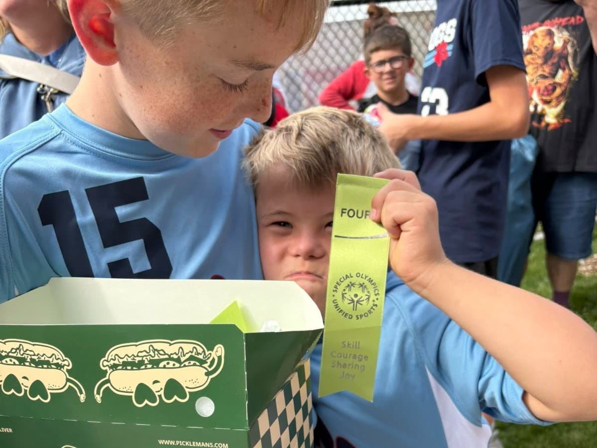 Elkhorn Top Dogs flag football athletes together in 2025